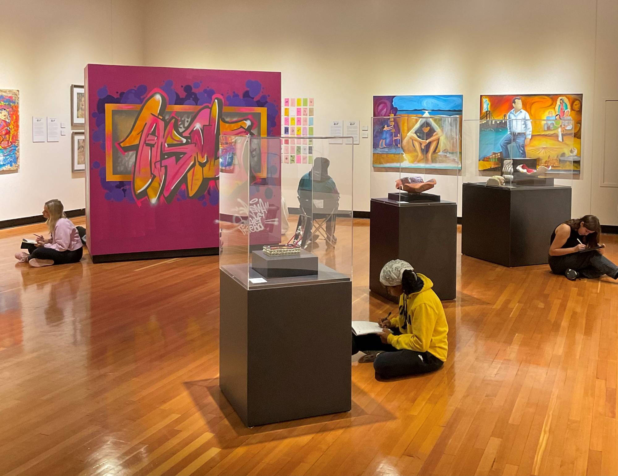 Students sitting in the gallery